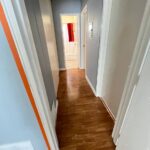Clean and shiny hardwood hallway after professional move out cleaning in Los Angeles