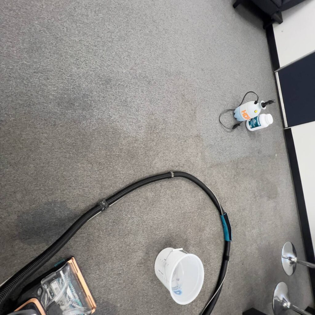 Commercial carpet cleaning with extraction equipment and HDX pre-spray in Los Angeles office